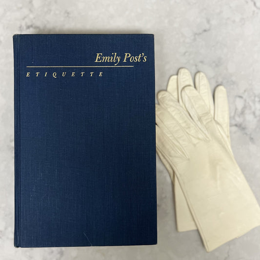 Blue Emily Post etiquette book